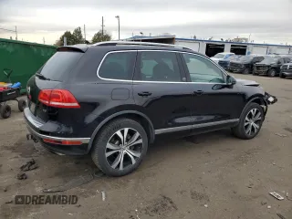 2017 Volkswagen Touareg Wolfsburg Edition with VIN WVGRF7BP9HD006520, listed as a Copart auction lot 84168634 with 76,596 mi miles and Salvage title. Bid and sale history available at DreamBid. Image 3.