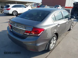 2014 Honda Civic Sedan LX with VIN 19XFB2F59EE026159, listed as a IAAI auction lot 42040655 with 104,190 mi miles. Bid and sale history available at carsss.com. Image 4.