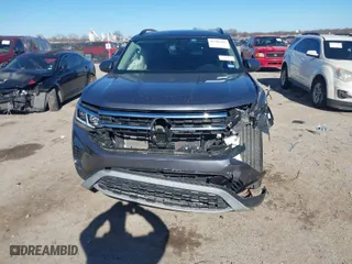 2023 Volkswagen Atlas 3.6L V6 SE w/Technology with VIN 1V2JR2CA4PC538749, listed as a IAAI auction lot 41206267 with 23,197 mi miles. Bid and sale history available at carsss.com. Image 6.