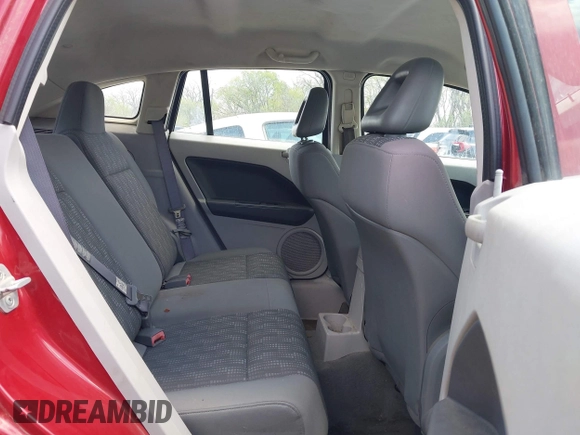 2007 Dodge Caliber SXT with VIN 1B3HB48B87D558516, listed as a IAAI auction lot 42004401 with 217,733 mi miles and . Bid and sale history available at DreamBid. Image 8.