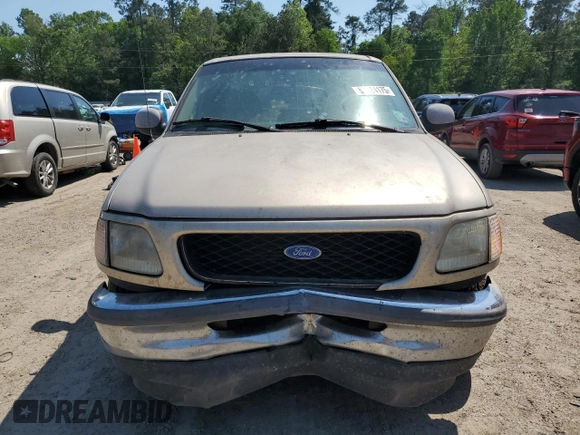 1997 Ford F-150 XL z VIN 1FTEX17LXVNB11737, wystawiony jako Copart lot #52624175 z przebiegiem 94 897 mil mil oraz Szkoda całkowita • Salvage title. Historia ofert i sprzedaży dostępna na DreamBid. Obrazek 5.