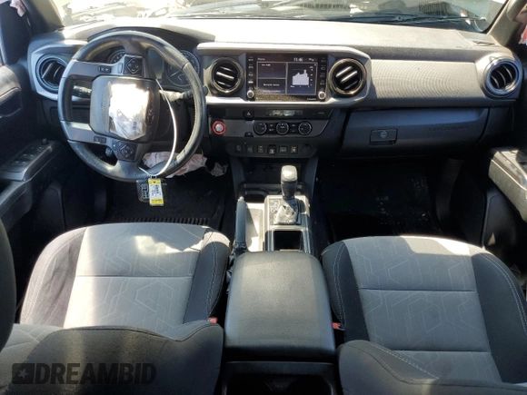2021 Toyota Tacoma SR5 z VIN 3TMAZ5CN6MM157145, wystawiony jako Copart lot #51641085 z przebiegiem Nie podano mil oraz Szkoda całkowita • Salvage title. Historia ofert i sprzedaży dostępna na DreamBid. Obrazek 8.