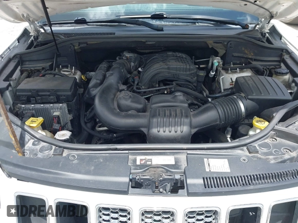 2014 Jeep Grand Cherokee Summit z VIN 1C4RJEJG1EC357948, wystawiony jako IAAI lot #42498652 z przebiegiem 213 715 mil mil oraz . Historia ofert i sprzedaży dostępna na DreamBid. Obrazek 10.