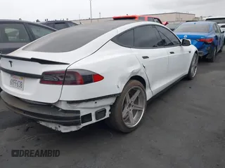 2013 Tesla Model S with VIN 5YJSA1CN1DFP07344, listed as a IAAI auction lot 42746574 with 181,538 mi miles and . Bid and sale history available at DreamBid. Image 4.