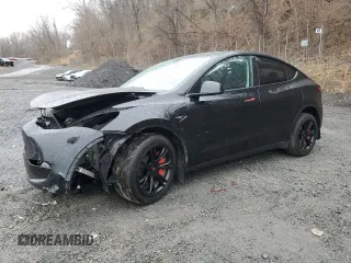 2023 Tesla Model Y Long Range z VIN 7SAYGDEE4PA185207, wystawiony jako Copart lot #52022935 z przebiegiem 25 435 mil mil oraz Szkody całkowita. Historia ofert i sprzedaży dostępna na DreamBid. Obrazek 1.