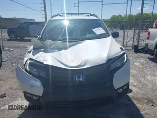 2019 Honda Passport Elite z VIN 5FNYF8H09KB015198, wystawiony jako IAAI lot #41989518 z przebiegiem 80 919 mil mil oraz . Historia ofert i sprzedaży dostępna na DreamBid. Obrazek 12.
