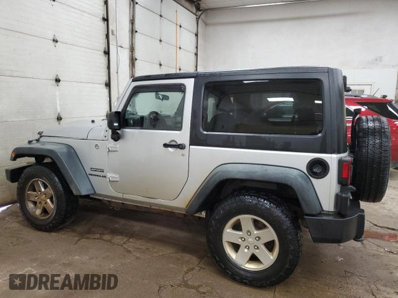 2012 Jeep Wrangler Sport with VIN 1C4AJWAGXCL133013, listed as a Copart auction lot 59788325 with 141,015 mi miles and Clean title. Bid and sale history available at DreamBid. Image 2.