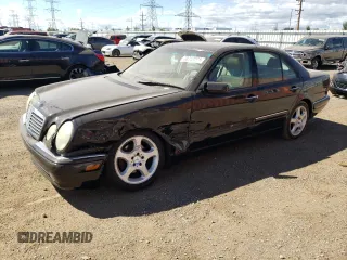 1999 Mercedes-Benz E-Class with VIN WDBJF70H6XA758770, listed as a Copart auction lot 70312094 with 0 mi miles and Salvage Title. Bid and sale history available at carsss.com. Image 1.