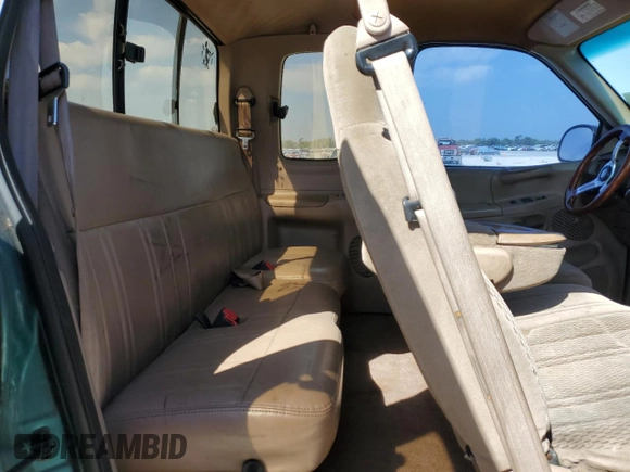 1997 Ford F-150 XL with VIN 1FTDX1861VKB19764, listed as a Copart auction lot 50773885 with 231,005 mi miles and Salvage Title. Bid and sale history available at carsss.com. Image 10.