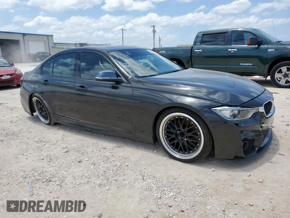 2013 BMW 3 Series 328i with VIN WBA3A5G55DNP21848, listed as a Copart auction lot 61733995 with 134,760 mi miles and Salvage title. Bid and sale history available at DreamBid. Image 4.