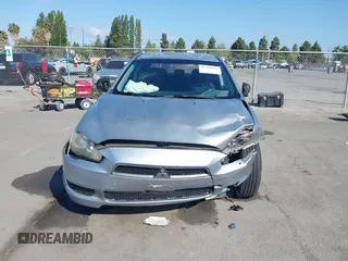 2009 Mitsubishi Lancer DE with VIN JA3AU16UX9U009351, listed as a IAAI auction lot 42139312 with 120,912 mi miles and . Bid and sale history available at carsss.com. Image 6.