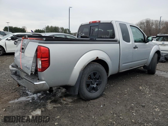 2005 Nissan Frontier LE with VIN 1N6AD06W35C434095, listed as a Copart auction lot 82559744 with 136,085 mi miles and Salvage title. Bid and sale history available at DreamBid. Image 3.