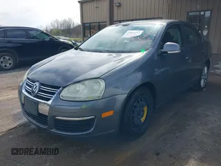 2009 Volkswagen Jetta Wolfsburg Edition with VIN 3VWRJ71K99M023071, listed as a IAAI auction lot 41853293 with 121,311 mi miles and . Bid and sale history available at DreamBid. Image 2.