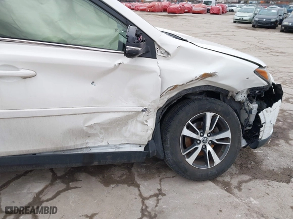 2018 Toyota RAV4 XLE with VIN JTMRFREV6JJ734927, listed as a IAAI auction lot 41510616 with 119,687 mi miles. Bid and sale history available at carsss.com. Image 6.