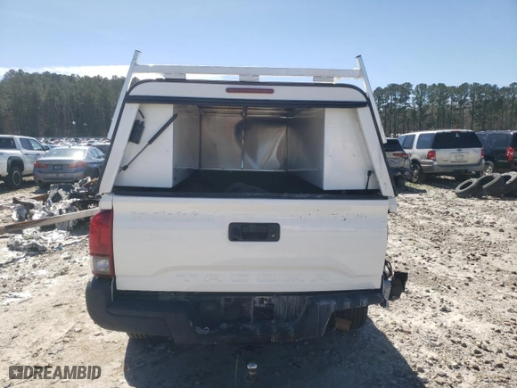 2021 Toyota Tacoma 2WD SR with VIN 3TYRX5GN0MT015610, listed as a Copart auction lot 46973975 with 58,264 mi miles and Salvage Title. Bid and sale history available at carsss.com. Image 6.