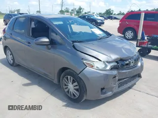 2017 Honda Fit LX with VIN JHMGK5H57HS015048, listed as a IAAI auction lot 42529139 with 94,411 mi miles and . Bid and sale history available at DreamBid. Image 1.