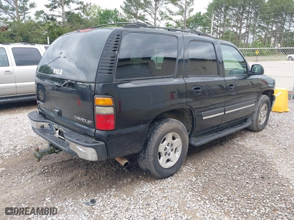 2004 Chevrolet Tahoe LT with VIN 1GNEC13Z04J262265, listed as a IAAI auction lot 42049698 with 376,367 mi miles. Bid and sale history available at carsss.com. Image 4.