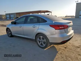 2018 Ford Focus SE z VIN 1FADP3F2XJL277462, wystawiony jako Copart lot #60360985 z przebiegiem 81 831 mil mil oraz Czysty tytuł • Clean title. Historia ofert i sprzedaży dostępna na DreamBid. Obrazek 2.