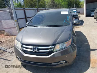 2015 Honda Odyssey Touring Elite with VIN 5FNRL5H98FB034700, listed as a IAAI auction lot 42019265 with 226,829 mi miles and . Bid and sale history available at DreamBid. Image 12.