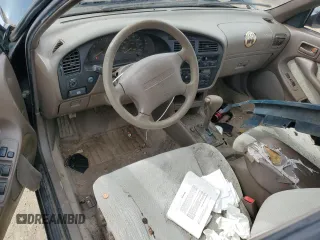 1994 Toyota Camry LE z VIN JT2GK12E2R0039606, wystawiony jako Copart lot #49840015 z przebiegiem 197 834 mil mil oraz Szkoda całkowita • Salvage title. Historia ofert i sprzedaży dostępna na DreamBid. Obrazek 8.