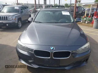 2014 BMW 3 Series 328d with VIN WBA3D3C50EK153111, listed as a IAAI auction lot 41980101 with 127,390 mi miles and . Bid and sale history available at carsss.com. Image 12.
