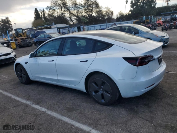 2023 Tesla Model 3 with VIN 5YJ3E1EA7PF579683, listed as a Copart auction lot 87651765 with 9,048 mi miles and Salvage Title. Bid and sale history available at carsss.com. Image 2.