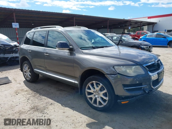 2010 Volkswagen Touareg VR6 with VIN WVGBF7A96AD002466, listed as a IAAI auction lot 41709052 with 204,819 mi miles and . Bid and sale history available at DreamBid. Image 1.