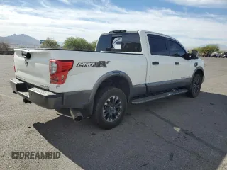 2018 Nissan Titan XD PRO-4X with VIN 1N6BA1F49JN548294, listed as a Copart auction lot 77817314 with 82,481 mi miles and Salvage Title. Bid and sale history available at carsss.com. Image 3.