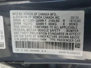 2024 Honda Civic Touring z VIN 2HGFE1F98RH336464, wystawiony jako Copart lot #50504775 z przebiegiem 14 655 mil mil oraz Szkoda całkowita • Salvage title. Historia ofert i sprzedaży dostępna na DreamBid. Obrazek 12.