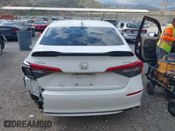2022 Honda Civic Sport with VIN 2HGFE2F5XNH590187, listed as a IAAI auction lot 42121686 with Not Provided miles and . Bid and sale history available at carsss.com. Image 15.