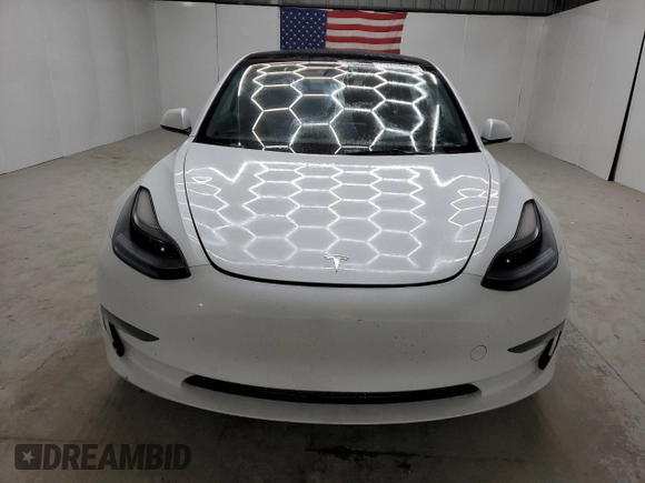 2023 Tesla Model 3 z VIN 5YJ3E1EA2PF439119, wystawiony jako Copart lot #60708065 z przebiegiem 48 717 mil mil oraz Nie do naprawy • Non repairable. Historia ofert i sprzedaży dostępna na DreamBid. Obrazek 5.