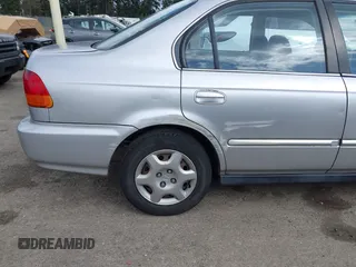 1998 Honda Civic EX with VIN 2HGEJ864XWH627385, listed as a IAAI auction lot 41933830 with 190,900 mi miles. Bid and sale history available at carsss.com. Image 6.