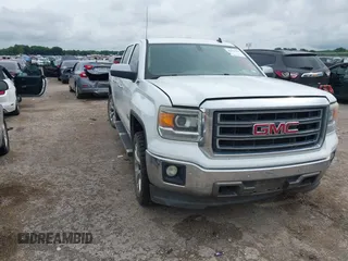 2014 GMC Sierra 1500 SLT with VIN 3GTU2VEC9EG338477, listed as a IAAI auction lot 42471314 with 192,020 mi miles and . Bid and sale history available at DreamBid. Image 1.