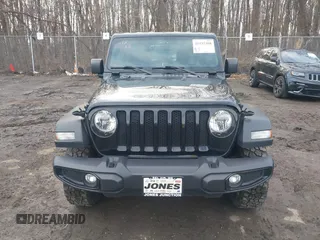 2022 Jeep Wrangler Unlimited Sport S with VIN 1C4HJXDG1NW141244, listed as a IAAI auction lot 41532388 with 27,829 mi miles. Bid and sale history available at carsss.com. Image 12.