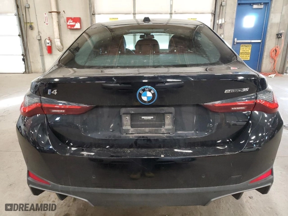 2023 BMW i4 eDrive35 with VIN WBY43AW00PFP65656, listed as a Copart auction lot 80448724 with NaN miles and Salvage Title. Bid and sale history available at carsss.com. Image 6.