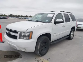 2007 Chevrolet Tahoe LTZ with VIN 1GNFC13027J402178, listed as a IAAI auction lot 41605898 with 203,677 mi miles and . Bid and sale history available at DreamBid. Image 2.