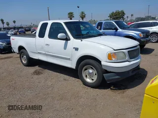 2000 Ford F-150 XL z VIN 1FTRX17L2YNA03263, wystawiony jako IAAI lot #42326528 z przebiegiem Nie podano mil oraz . Historia ofert i sprzedaży dostępna na DreamBid. Obrazek 1.