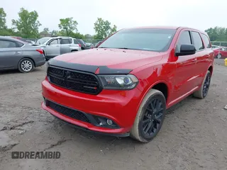 2015 Dodge Durango SXT with VIN 1C4RDJAG2FC128082, listed as a IAAI auction lot 42447872 with 141,655 mi miles and . Bid and sale history available at DreamBid. Image 16.