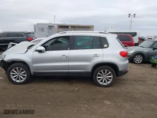 2017 Volkswagen Tiguan Wolfsburg Edition with VIN WVGSV7AX8HK031345, listed as a IAAI auction lot 41348567 with 130,313 mi miles. Bid and sale history available at carsss.com. Image 14.
