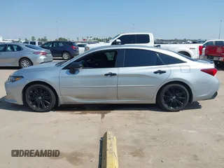 2021 Toyota Avalon XSE Nightshade z VIN 4T1EZ1FB6MU069666, wystawiony jako IAAI lot #41684183 z przebiegiem 75 320 mil mil oraz . Historia ofert i sprzedaży dostępna na DreamBid. Obrazek 14.
