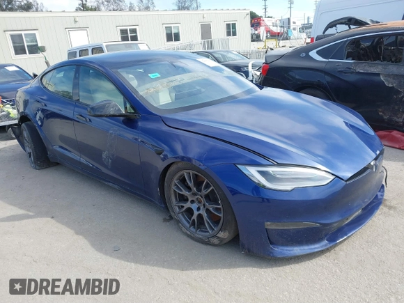 2021 Tesla Model S Long Range with VIN 5YJSA1E51MF442874, listed as a IAAI auction lot 39406495 with 36,127 mi miles and . Bid and sale history available at DreamBid. Image 1.