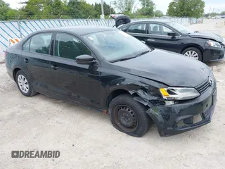 2014 Volkswagen Jetta S z VIN 3VW2K7AJ1EM394175, wystawiony jako IAAI lot #42351755 z przebiegiem 200 883 mil mil oraz . Historia ofert i sprzedaży dostępna na DreamBid. Obrazek 1.