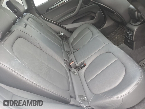 2018 BMW X1 xDrive28i with VIN WBXHT3C35J5L29298, listed as a Copart auction lot 59041435 with 27,612 mi miles and Salvage title. Bid and sale history available at DreamBid. Image 11.