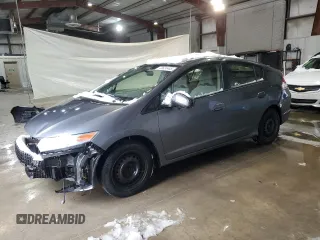 2012 Honda Insight z VIN JHMZE2H31CS006626, wystawiony jako Copart lot #43624445 z przebiegiem 155 512 mil mil oraz Czysty tytuł • Clean title. Historia ofert i sprzedaży dostępna na DreamBid. Obrazek 1.