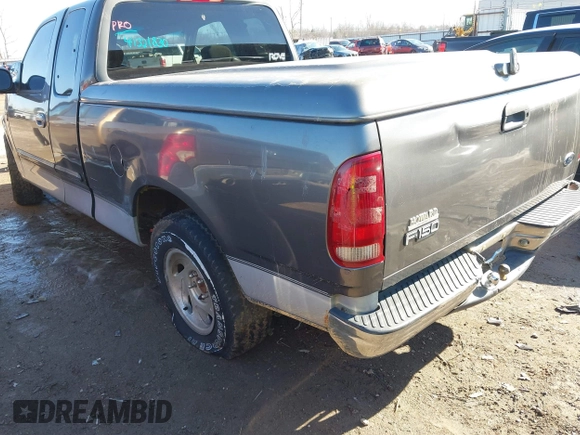 2003 Ford F-150 XL with VIN 2FTRX17W63CA93767, listed as a IAAI auction lot 41321830 with Not provided miles and . Bid and sale history available at DreamBid. Image 3.