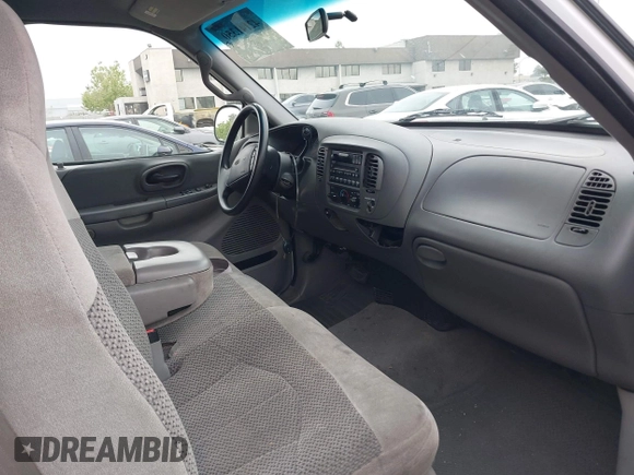 2000 Ford F-150 XL with VIN 1FTRX17L4YNA39407, listed as a IAAI auction lot 42141350 with 82,824 mi miles and . Bid and sale history available at DreamBid. Image 5.