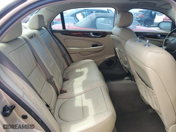 2005 Jaguar XJ with VIN SAJWA79C05SG46913, listed as a Copart auction lot 75092794 with 0 mi miles and Salvage Title. Bid and sale history available at carsss.com. Image 10.