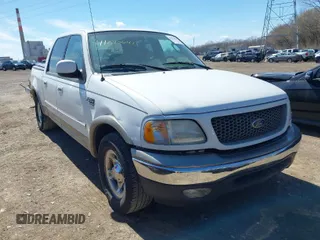 2003 Ford F-150 XLT with VIN 1FTRW07663KD57580, listed as a IAAI auction lot 41870643 with 256,497 mi miles. Bid and sale history available at carsss.com. Image 1.