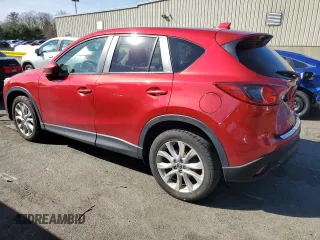 2014 Mazda CX-5 Grand Touring with VIN JM3KE4DY8E0421660, listed as a Copart auction lot 48588525 with 144,939 mi miles and Salvage Title. Bid and sale history available at DreamBid. Image 2.