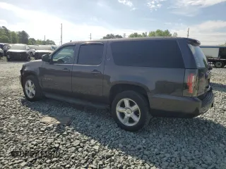2010 Chevrolet Suburban LT with VIN 1GNUCJE03AR196074, listed as a Copart auction lot 53870425 with 265,793 mi miles and Salvage Title. Bid and sale history available at DreamBid. Image 2.